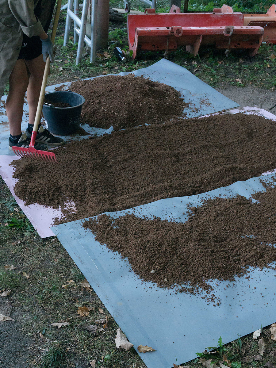 Laying out the gathered earth for drying